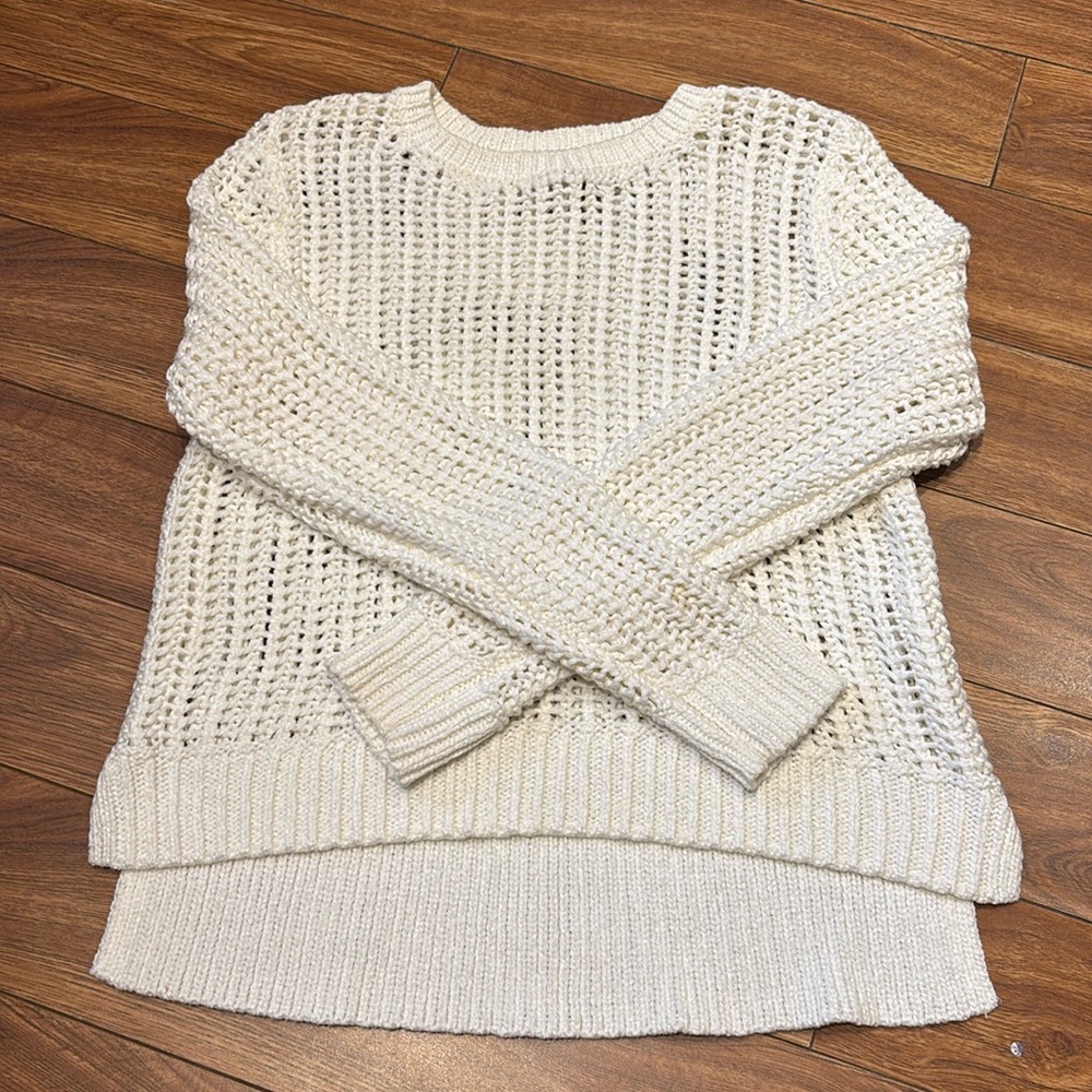 Woman’s Michael Kors white sweater, size US large.